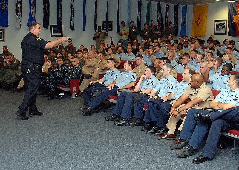 File:US Navy 090317-N-3013W-015 Deputy Wade Chapman of the Jacksonville Sheriff's Office takes questions from the Sailors.jpg