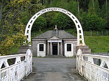 The Mar Lodge Gatehouse, as seen from Victoria Bridge Victoria-Bridge,-Inverey-02.jpg