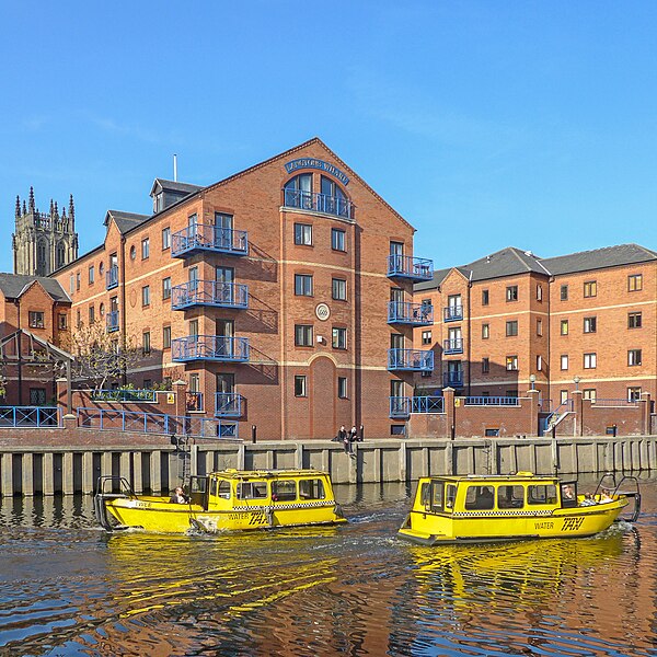 File:Water taxis pass in the River Aire, Leeds (17061255128).jpg