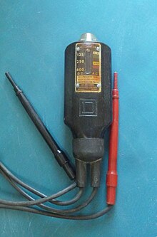 A solenoid voltmeter with attached test leads; the instrument is more rugged than a D'arsonoval type of meter, but not as precise. Wigginton voltage tester.jpg