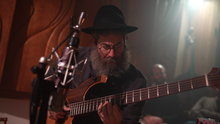 Yosef Gutman Levitt at a music event.png