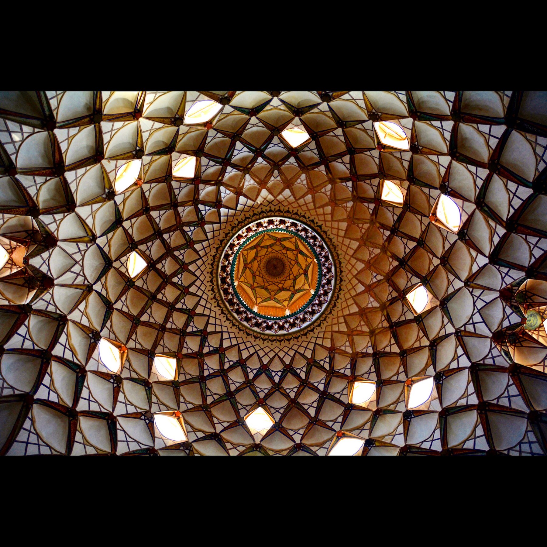 The ceiling of one of the rooms in Tabātabāei House in Kashan. Photograph: 13ehnam Licensing: CC-BY-SA-4.0