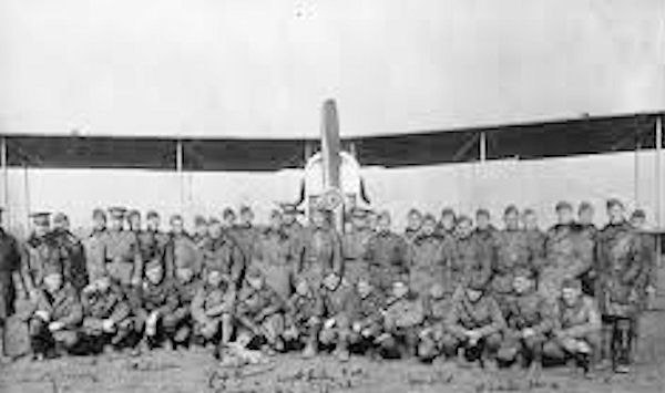 Members of the 166th Aero Squadron in front of a De Havilland DH-4