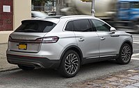 2019 Lincoln Nautilus Reserve AWD in Ingot Silver Metallic, rear right.jpg