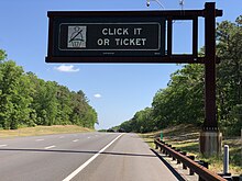 Variable-message sign with a Click It or Ticket message along the Garden State Parkway in New Jersey 2021-05-27 10 57 20 Variable message sign reading "Click It Or Ticket" along northbound New Jersey State Route 444 (Garden State Parkway) just north of Exit 63 in Stafford Township, Ocean County, New Jersey.jpg