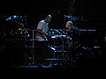 Genesis concert at the Wachovia Center, Philadelphia, Pennsylvania, USA. Performing a drum duet between Chester Thompson and Phil Collins.