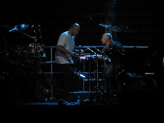 Thompson and Collins during a drum duet in 2007