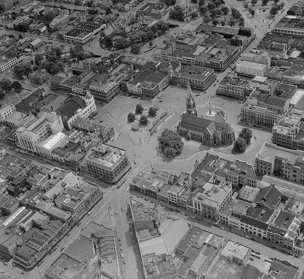 Aerial view of Cathedral Square showing the curved alignment of Colombo Street (pre-1954)