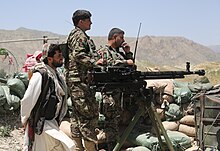 Afghan National Army soldiers with the 1st Kandak, 4th Brigade, 201st Corps look for enemy activity from a watchtower outside Hesarak village in Nangarhar province, Afghanistan, May 15, 2013 130515-A-WI517-096.jpg