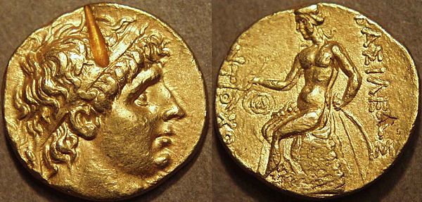 Gold stater of the Seleucid king Antiochus I Soter minted at Ai-Khanoum, c. 275 BC. Obverse: Diademed head of Antiochus. Reverse: Nude Apollo  seated on omphalos, leaning on bow and holding two arrows. Greek legend: ΒΑΣΙΛΕΩΣ ΑΝΤΙΟΧΟΥ (of King Antiochos). Δ monogram of Ai-Khanoum in left field.
