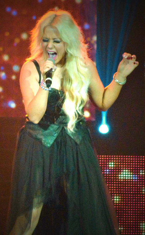 Amelia Lily, a finalist on The X Factor, signed to Xenomania Records in 2012.