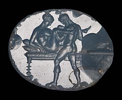 Engraving of an erotic scene on an ancient Greek gem