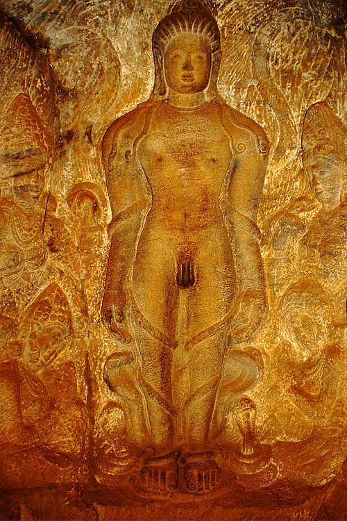 Sculpture depicting Bahubali's meditation in Kayotsarga posture with vines enveloped around his body (Photo: Badami caves)