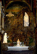 The Grotto Shrine where the remains of Father Nelson Baker were placed in a sarcophagus. Baker Tomb Grotto.jpg