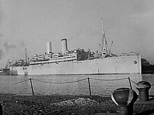 Volendam as a troop ship in 1944 Bijschrift A famous Dutch liner somewhere in England Een befaamd Nederlands..., Bestanddeelnr 935-3155.jpg