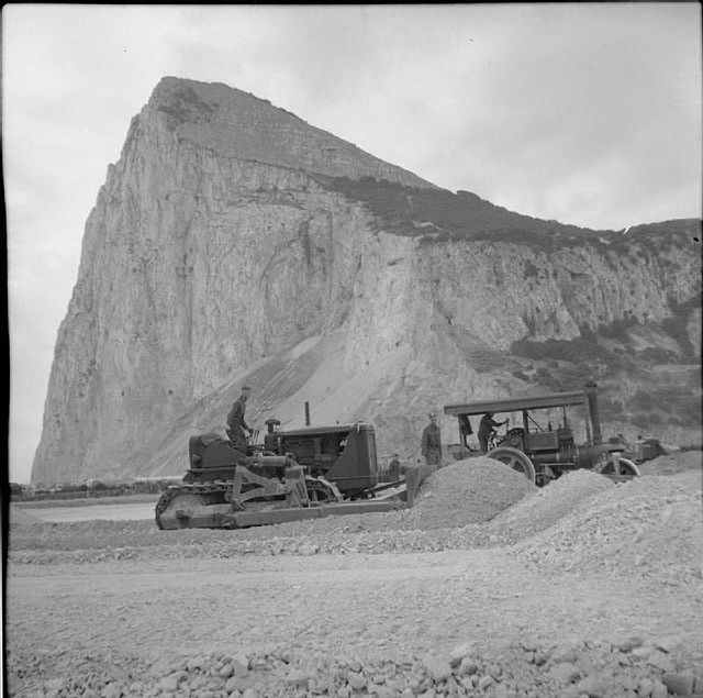 A bulldozer and steamroller being used during the construction of a new aerodrome on Gibraltar, November 1941