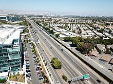 An aerial view of California State Route 237, Sunnyvale, looking east, taken from above a parking garage on the north side of the road CA-237 looking east near exit 5.jpg