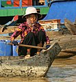 Cambodia-Tonle Sap-212-Frau in Boot-2007-gje.jpg