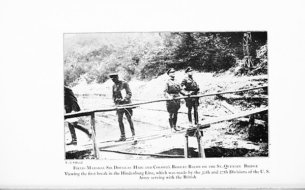 Colonel Robert Bacon and Field Marshal Sir Douglas Haig on the St.-Quentin Bridge, viewing the first break in the Hindenburg Line which was made by th