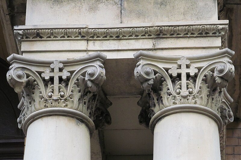 Capitals with crosses