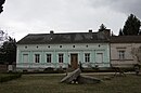 Homestead, consisting of a house, two stable buildings and a barn