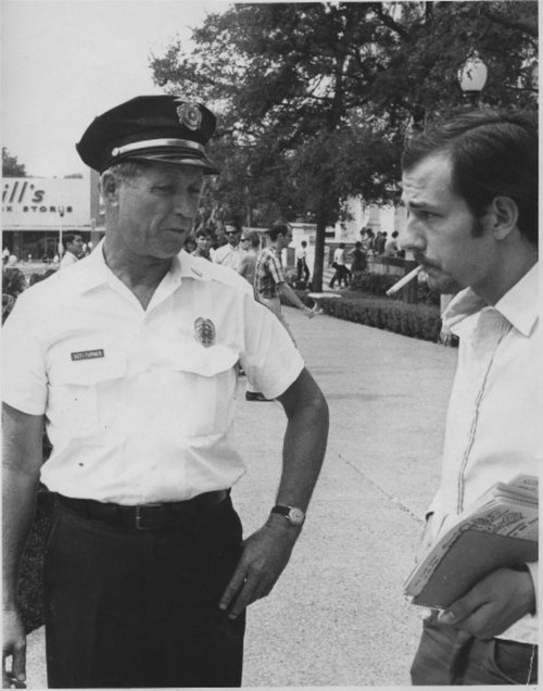 Thorne Dreyer (right) and University of Texas campus cop, October 1966.