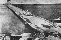 An Egyptian armored vehicle crosses the canal over one of the bridges, 7 October. Egyptian armor crossing suez canal.jpg