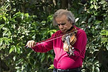 The blind musician Eskandar Abadi on the violin