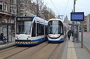 Tramlijn 5 met 15G-tram en een Combino in de Paulus Potterstraat; april 2021.