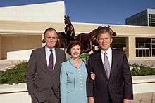 Governor Bush (right) with father, former president George H. W. Bush, and wife, Laura, at the dedication of the George H.W. Bush Presidential Library and Museum, 1997 George H. W. Bush, Laura Bush, George W. Bush 1997.jpg