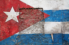 A Cuban Flag painted in the crumbling walls of Old Havana (La Habana), Cuba