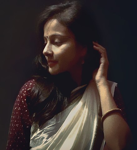 An Indian woman in her traditional attire