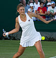 Irina-Camelia Begu competing in the first round of the 2015 Wimbledon Championships.