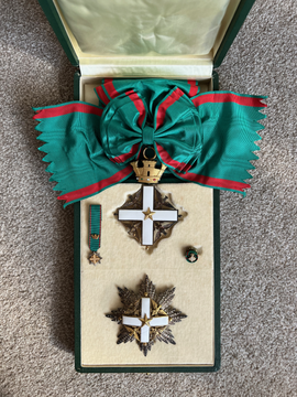 The Grand Cross grade of the Order in case of issue.