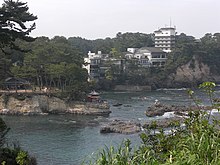 Izura Beach with rebuilt Rokkakudo in 2012.jpg