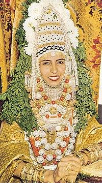Jewish Yemenite bride in traditional bridal vestment, adorned with a henna wreath, 1958 Jewish Yemenite bride.jpg
