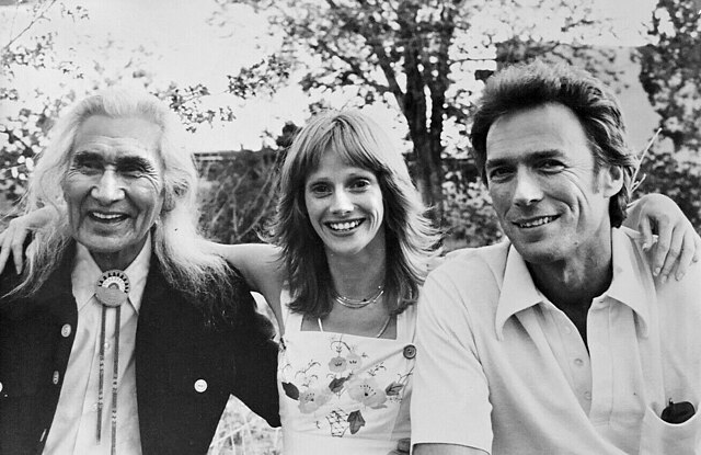 Dan George with Sondra Locke and Clint Eastwood at a barbecue in Santa Fe, New Mexico, promoting The Outlaw Josey Wales (1976).