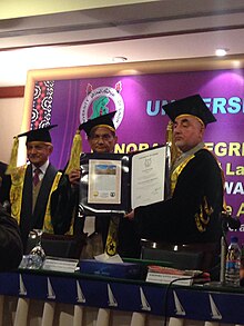 Justice DrAgha Rafiq Ahmed Khan being awarded with the Doctorate of Law Degree by the University of Sindh Vice Chancellor. Justice Dr Agha Rafiq Ahmed Khan awarded with Honoris Causa Doctor of Law Degree by University of Sindh.jpg