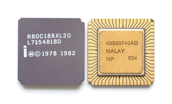 An Intel R80C188XL20, an LCC variant of the 80188 processor. It has a ceramic heat spreader and gold plated contacts on the bottom.