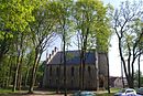 Church with a park-like cemetery and a colonist cemetery