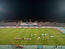 Kohorta fans at the stands of Stadion Gradski vrt before the match against PSV in 2017 Kohorta uoci utakmice Osijek-PSV.jpg