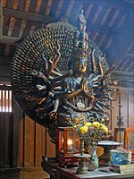 Avalokiteśvara of One Thousand Arms, lacquered and gilded wood. Restored in 1656 CE. Bút Tháp Temple, Bắc Ninh Province, Vietnam