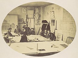 The Opera Agence drafting room: Garnier is second from the right, with Edmond Le Deschault on the far right, and Victor Louvet, second from the left Louis-Emile Durandelle, Charles Garnier in the Drafting Room While Designing the New Paris Opera, ca. 1870.jpg