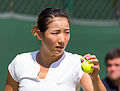 Misa Eguchi competing in the first round of the 2015 Wimbledon Qualifying Tournament at the Bank of England Sports Grounds in Roehampton, England. The winners of three rounds of competition qualify for the main draw of Wimbledon the following week.