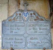 The War Memorial plaque on the church