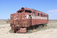 NSU56: derelict body shell and bogies at Marree, 2021