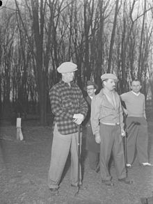 Playing golf (in plaid) in 1948 in Montreal News. Chevalier BAnQ P48S1P16787.jpg