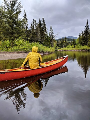 A canoeist on the Opalescent River near its confluence with the Hudson River (GPS 44.018172, -74.052487). Opalescent River.jpg