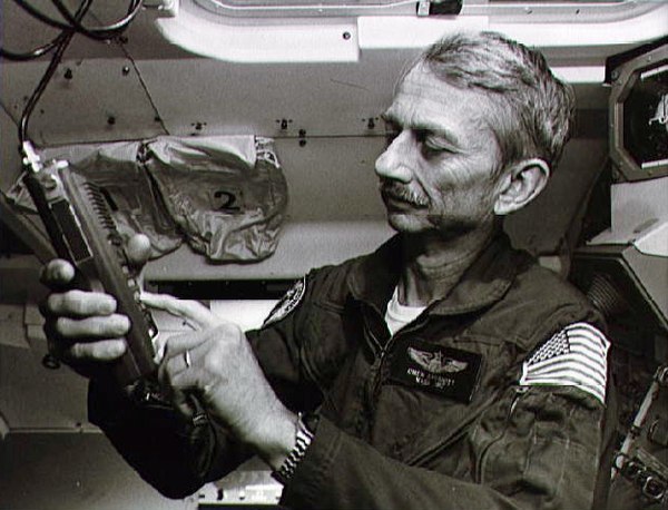 Garriott using an amateur radio during STS-9 training in 1983