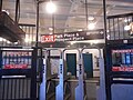 The turnstiles within the station house.